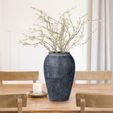 Dark Ceramic Vase in wood table