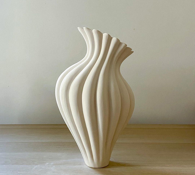 Are there more creative uses for vases besides just flower arrangements?