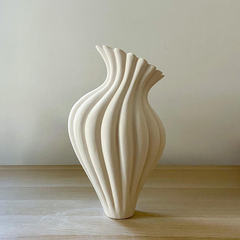 Are there more creative uses for vases besides just flower arrangements?